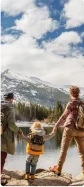 family on a mountain lake